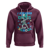 Maroon astronaut dabbing hoodie with colorful "I survived" "days of school" graphic