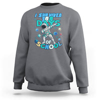 Charcoal crewneck sweatshirt with astronaut dabbing graphic and school days print