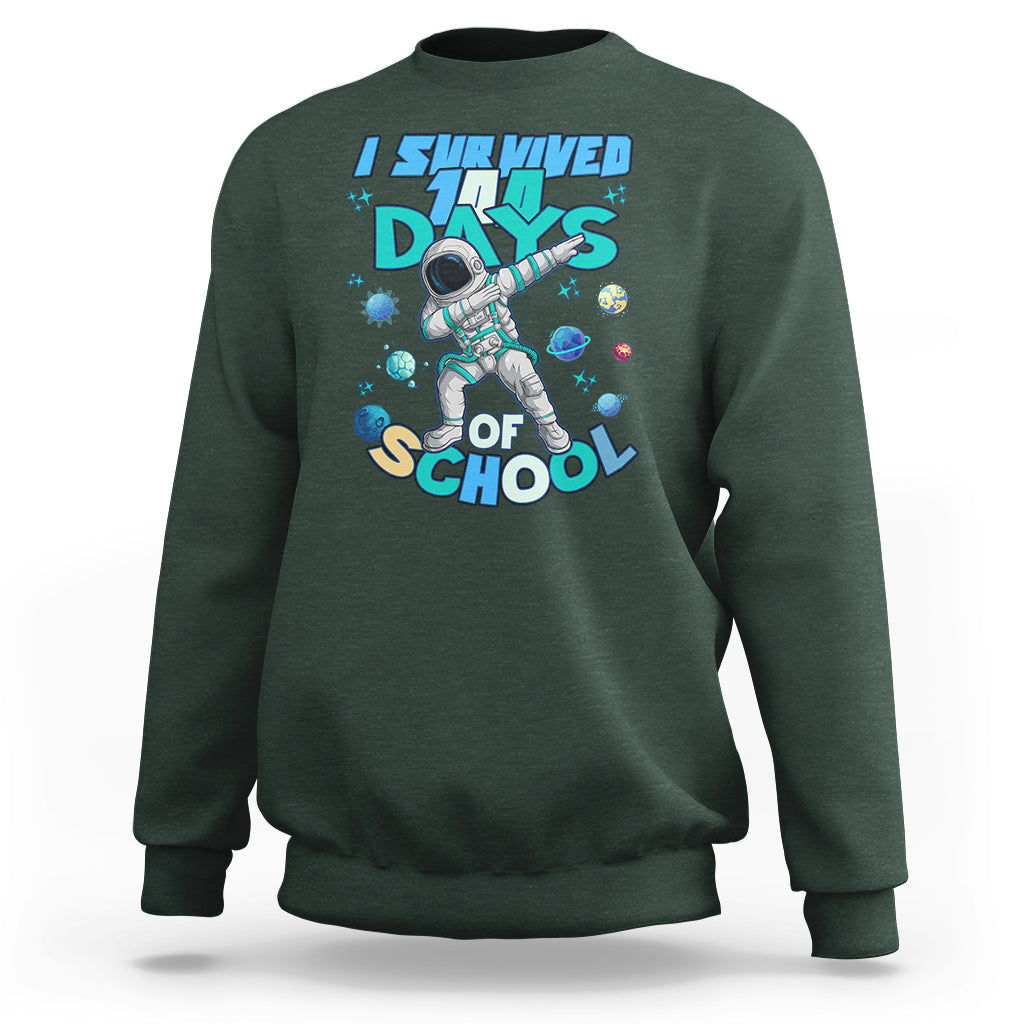 Dark forest green crewneck sweatshirt with astronaut dabbing graphic and school days print