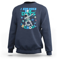 Navy crewneck sweatshirt with astronaut dabbing graphic and school days print