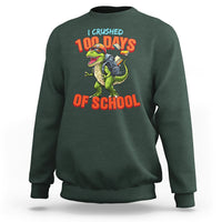 Dark forest green sweatshirt with dinosaur '100 Days of School' front graphic.