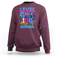 Maroon kids gamer sweatshirt with 'LEVEL 100 days of school' game controller graphic