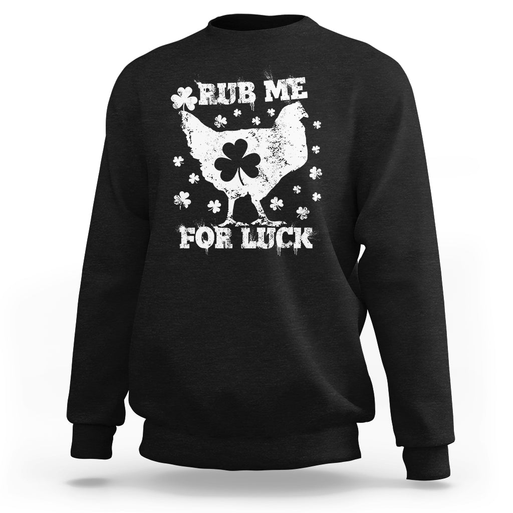 Black crewneck sweatshirt with white shamrock chicken graphic and 'Rub me for luck'.