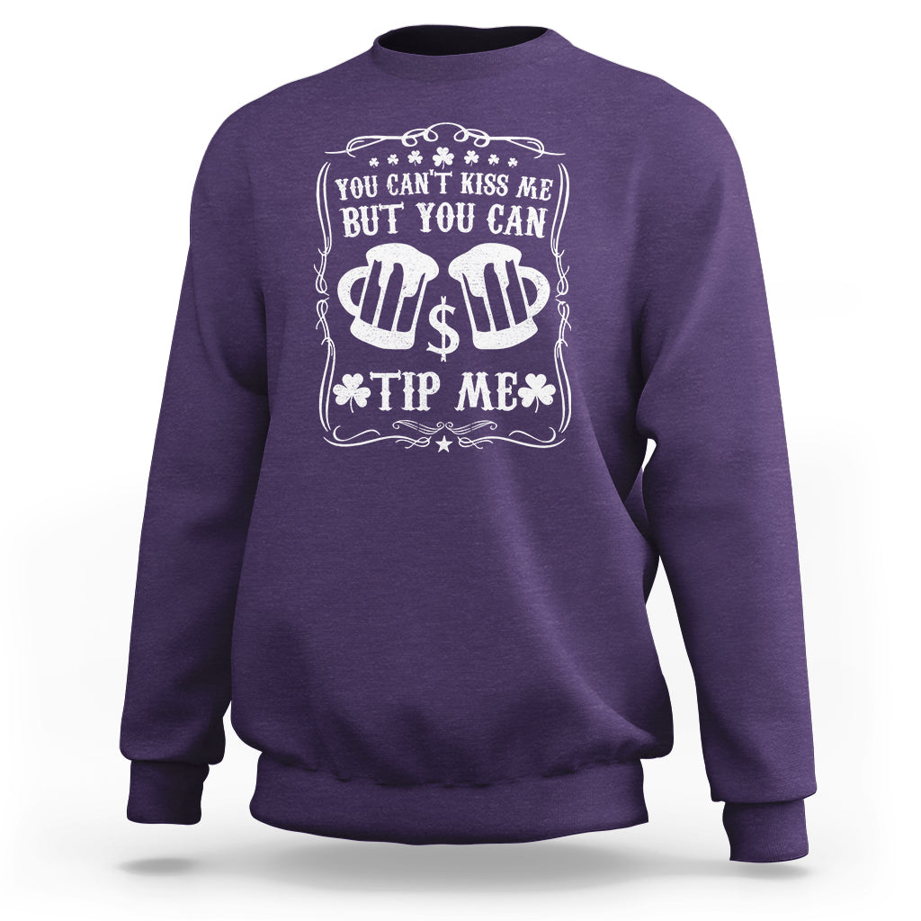 Purple sweatshirt with white money-bag graphic and text: "You can't kiss me" "tip me".
