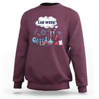 Maroon lab-themed sweatshirt with 'LAB WEEK' science beaker graphic
