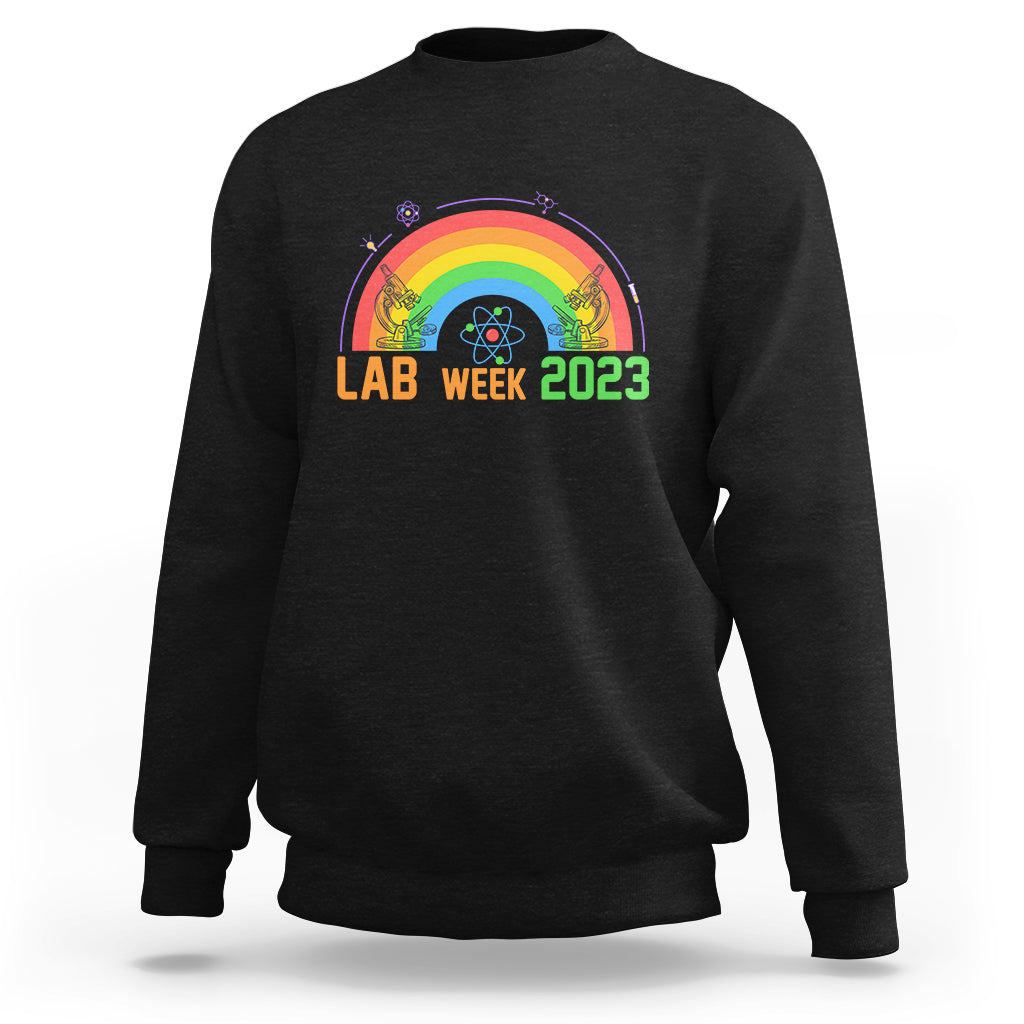Crewneck lab sweatshirt in dark charcoal with Lab Week 2023 rainbow graphic