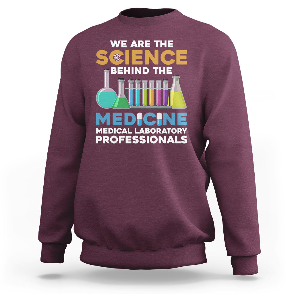 Maroon medical lab tech sweatshirt with colorful science and medicine graphic