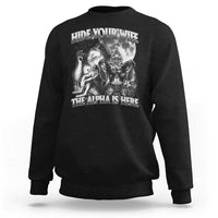 Black crewneck sweatshirt with wolf and woman graphic, ribbed cuffs and hem
