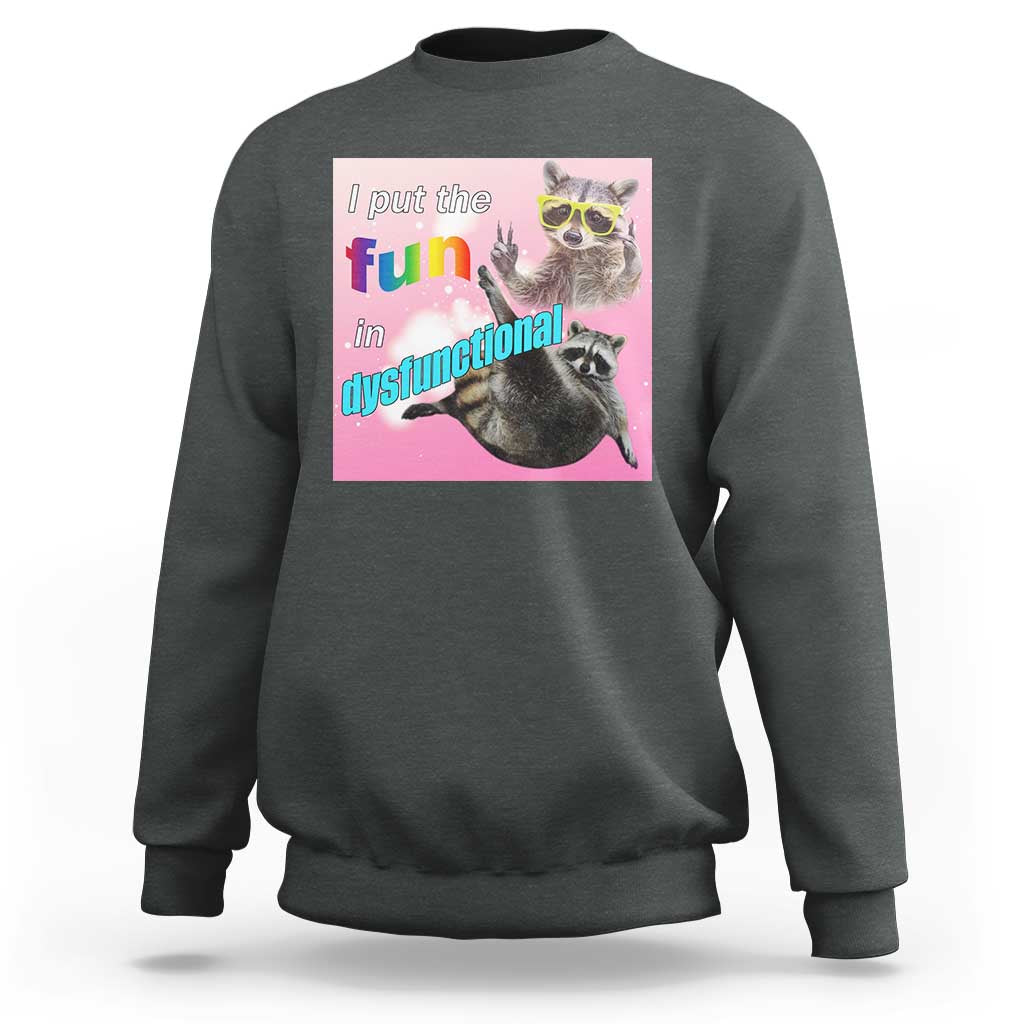 Dark heather raccoon meme sweatshirt with colorful front raccoon slogan graphic.