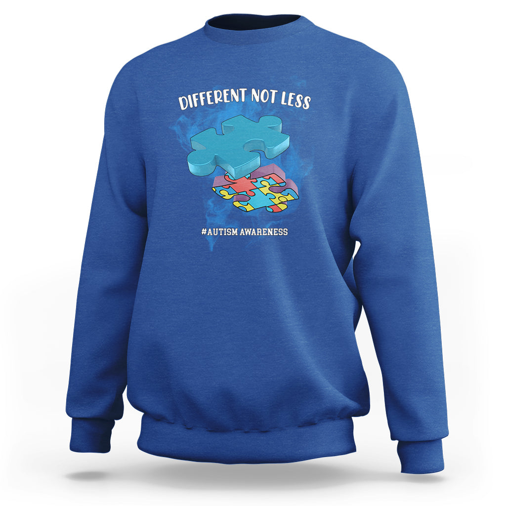 Royal blue crewneck sweatshirt with “DIFFERENT NOT LESS” autism awareness graphic