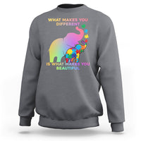 Charcoal crewneck sweatshirt with autism elephant graphic and 'What makes you different' text