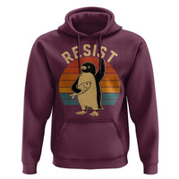 Maroon hoodie with front kangaroo pocket and penguin 'RESIST' graphic