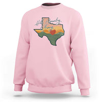 Light pink crewneck sweatshirt with Texas map graphic and “Hill Country Strong” text