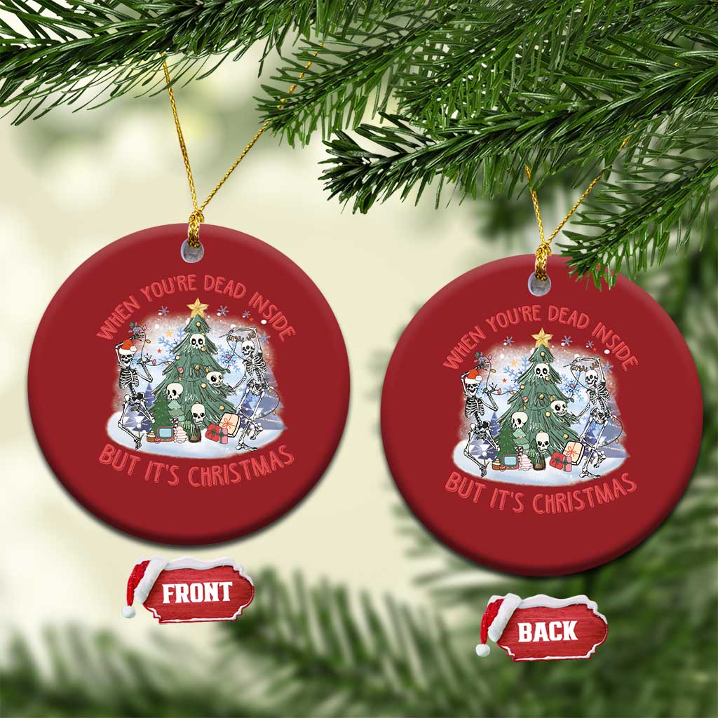 Two red round Christmas ornaments with skeleton scene; front and back shown