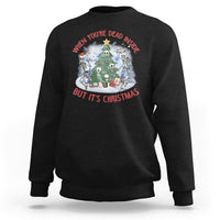 Black crewneck sweatshirt with Christmas graphic: skeletons around a tree, red/white text