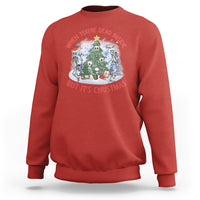Red crewneck sweatshirt with Christmas graphic: skeletons around a tree, red/white text