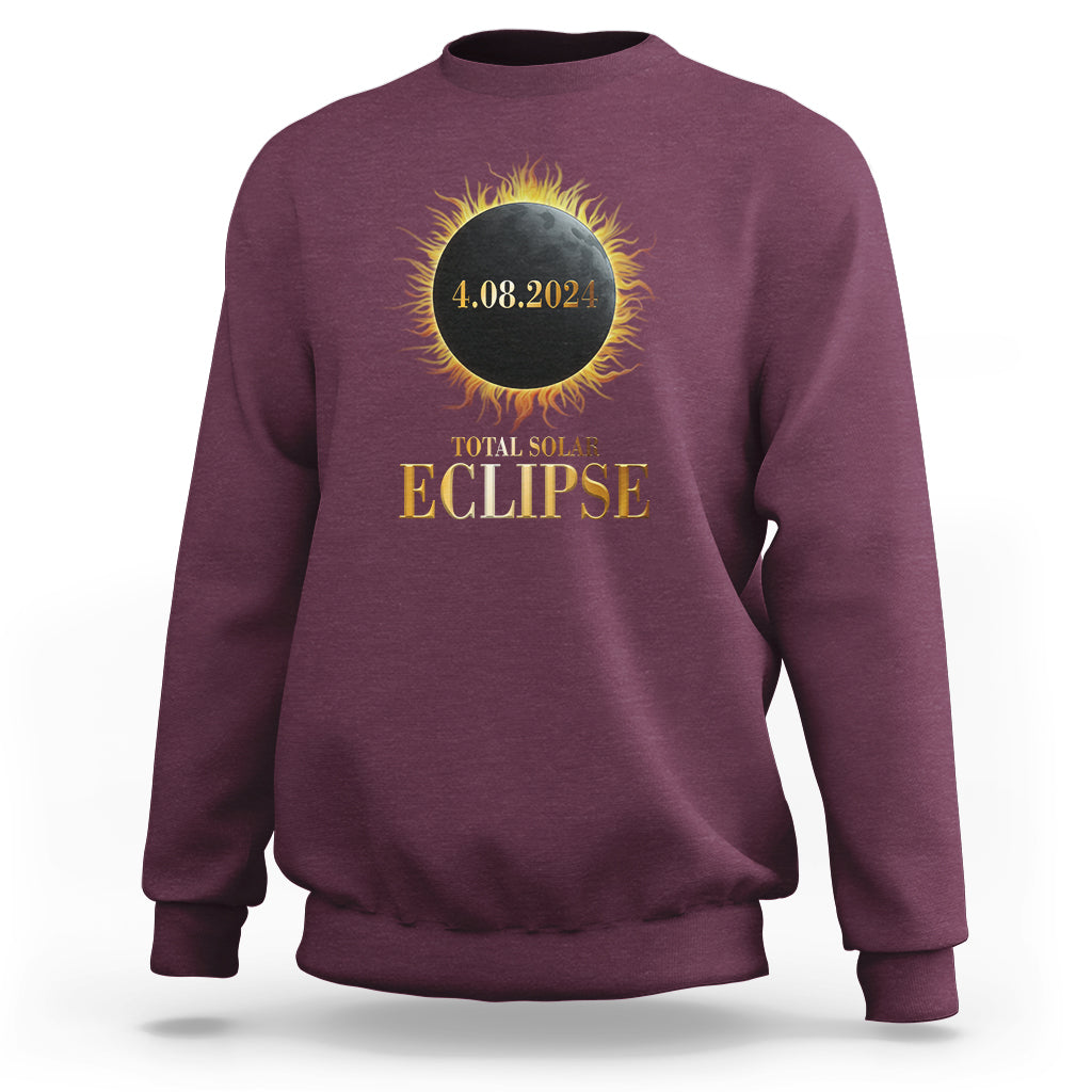 Solar eclipse sweatshirt, maroon with gold and yellow eclipse graphic on back