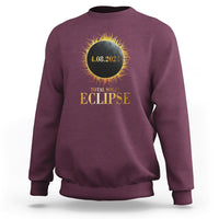 Solar eclipse sweatshirt, maroon with gold and yellow eclipse graphic on back