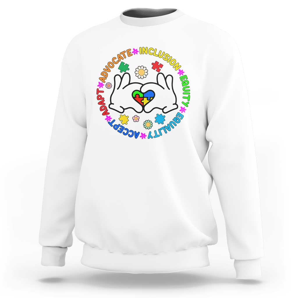 White crewneck sweatshirt with colorful cat-face inclusion graphic