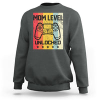 Charcoal crewneck sweatshirt with “Mom Level Unlocked” gaming controller graphic