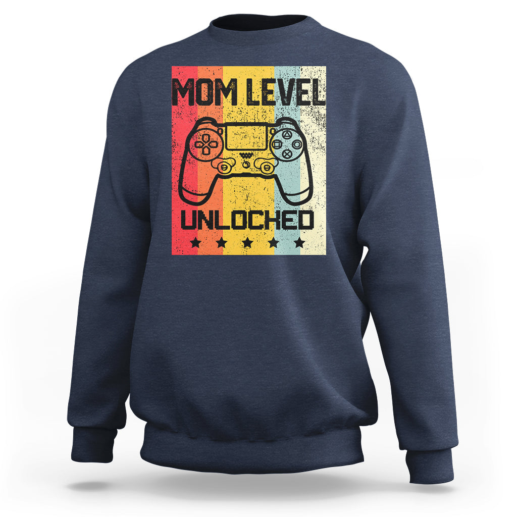 Navy crewneck sweatshirt with “Mom Level Unlocked” gaming controller graphic