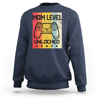 Navy crewneck sweatshirt with “Mom Level Unlocked” gaming controller graphic