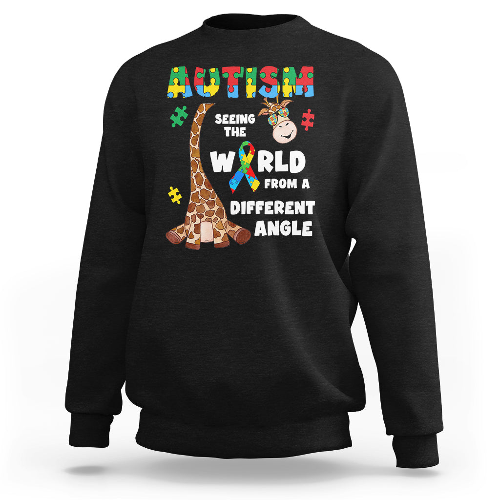 Black crewneck sweatshirt with giraffe puzzle graphic and autism-style slogan on front