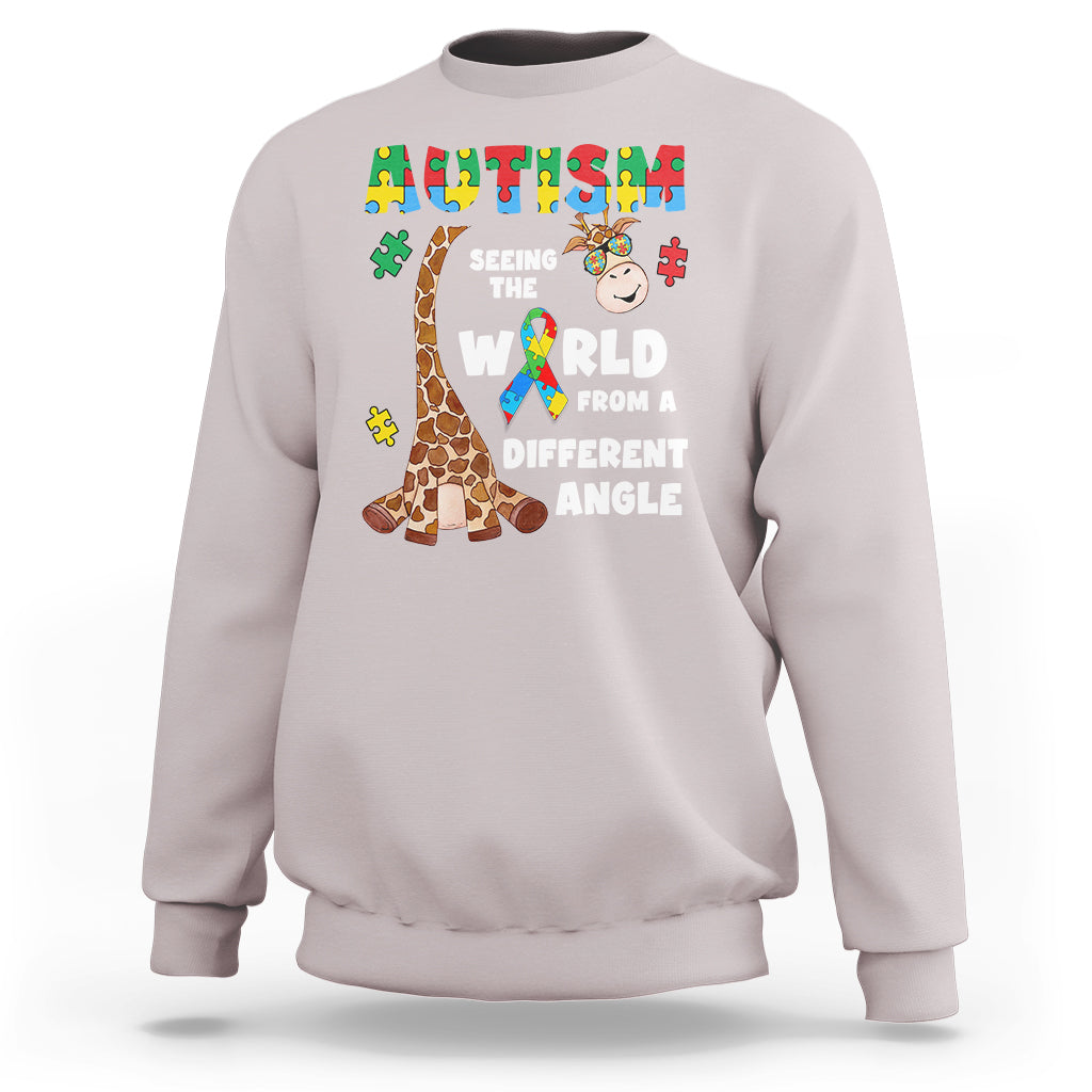 Ice gray crewneck sweatshirt with giraffe puzzle graphic and autism-style slogan on front