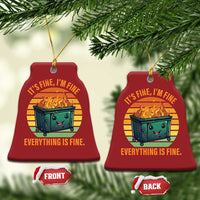 Two red bell-shaped Christmas ornaments with burning dumpster graphic and slogan, one front/back view.