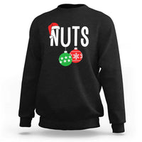 Black crewneck sweatshirt with “NUTS” holiday nut graphic and red Santa hat