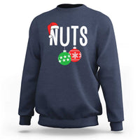 Navy crewneck sweatshirt with “NUTS” holiday nut graphic and red Santa hat