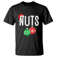 Black crewneck T-shirt with "NUTS" text and three holiday ornament graphics.