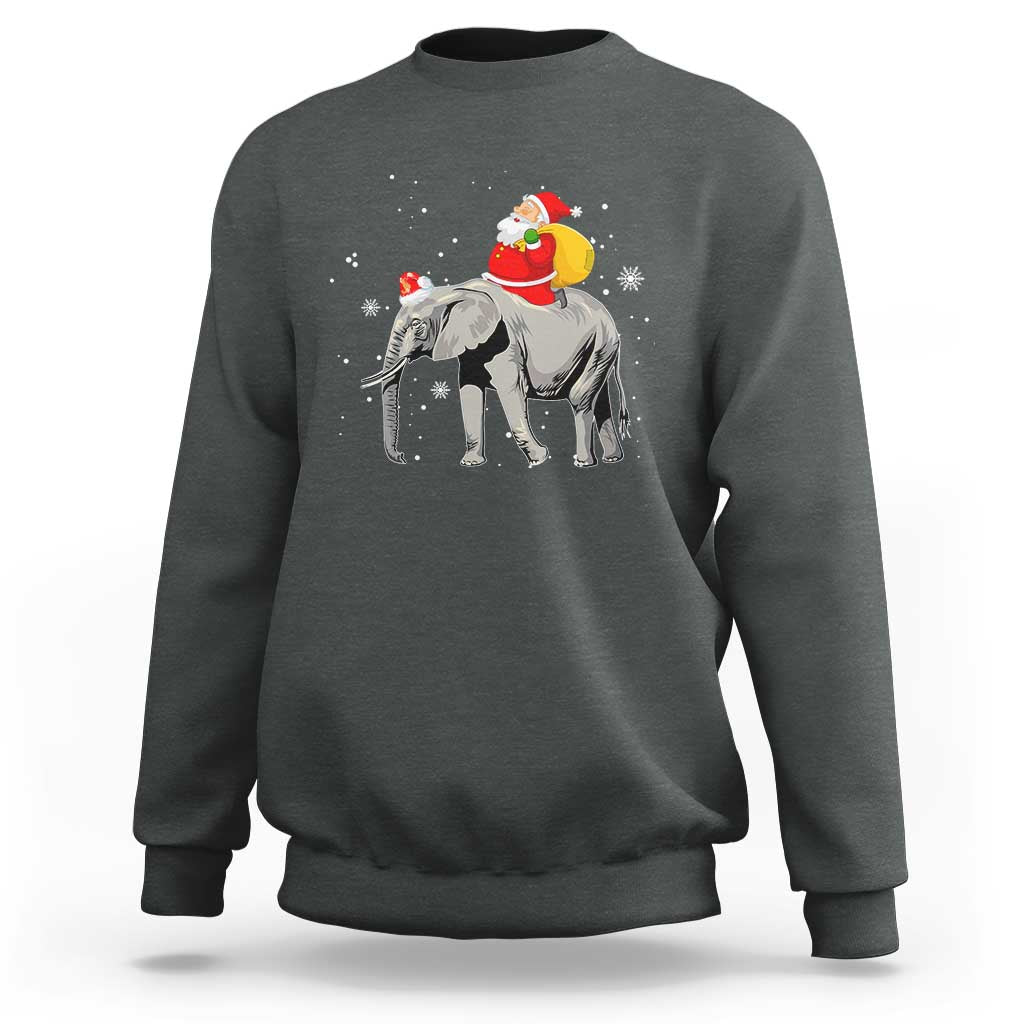 Dark heather crewneck sweatshirt with Santa riding an elephant graphic on the back