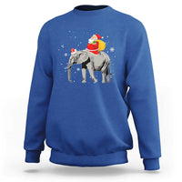 Royal blue crewneck sweatshirt with Santa riding an elephant graphic on the back
