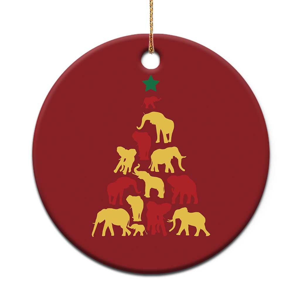 Red round Christmas ornament with gold safari animals, green star, and gold hanging loop.