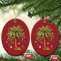 Pair of red oval palm tree ornaments with multicolor lights, front and back shown.