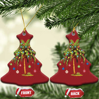Pair of red Christmas tree-shaped palm tree ornaments with multicolor lights, front/back.