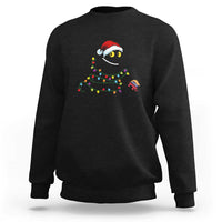 Black crewneck sweatshirt with cute holiday cat graphic and colorful lights design