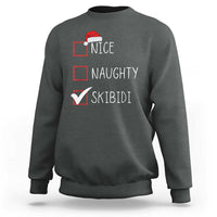 Dark heather crewneck sweatshirt with 'NICE NAUGHTY SKIBIDI' graphic and Santa hat icon