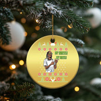 Gold round Christmas ornament hanging from tree, rapper graphic with 'FO' SHIZZLE MY NIZZLE'.