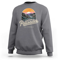 Charcoal crewneck sweatshirt with 'Palisades California' landscape graphic on chest