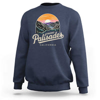 Navy crewneck sweatshirt with 'Palisades California' landscape graphic on chest