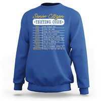 Royal blue crewneck sweatshirt with “Senior Citizen Texting Code” front graphic