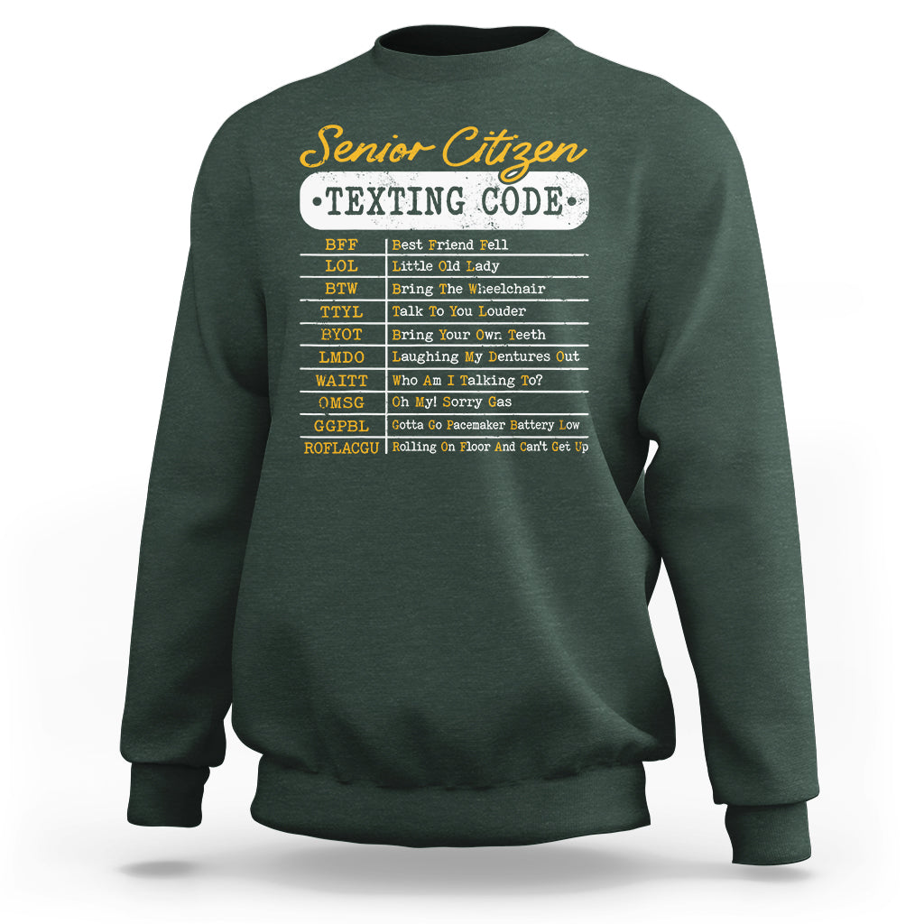 Forest green crewneck sweatshirt with “Senior Citizen Texting Code” front graphic