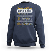 Navy crewneck sweatshirt with “Senior Citizen Texting Code” front graphic