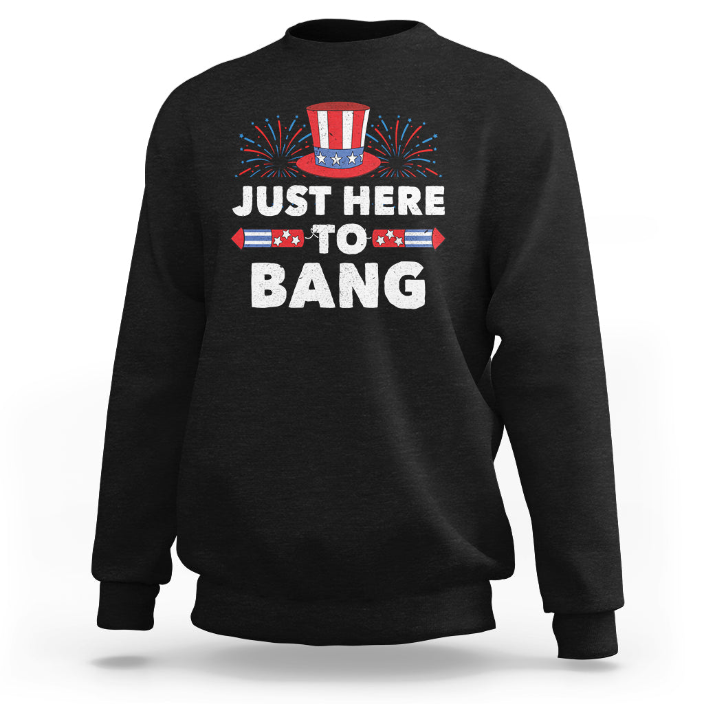 Black crewneck sweatshirt with 'JUST HERE TO BANG' fireworks graphic