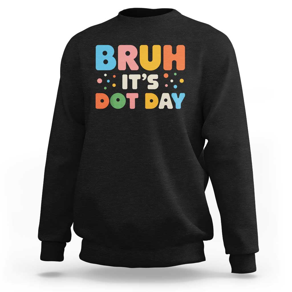 Black crewneck sweatshirt with colorful "BRUH IT'S DOT DAY" graphic on back