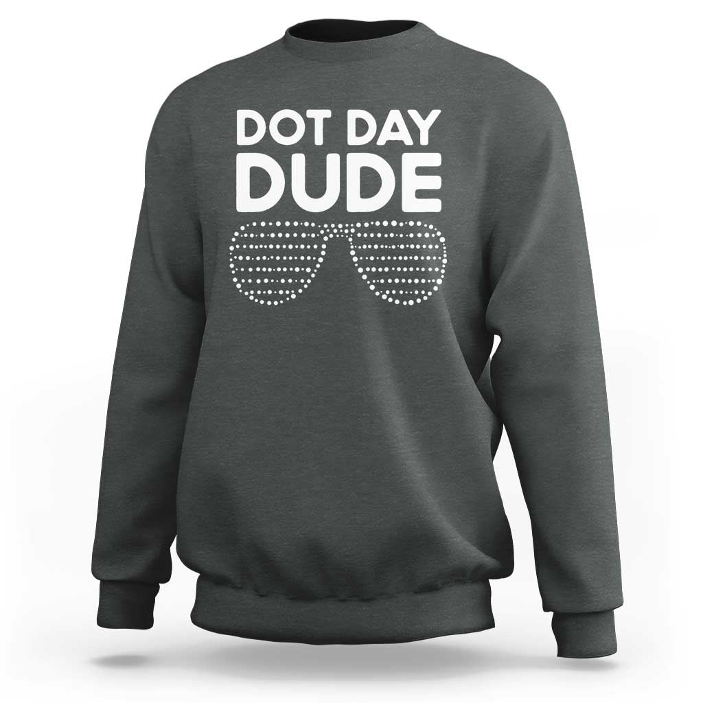 Dark gray crewneck sweatshirt with white “DOT DAY DUDE” dotted glasses graphic.