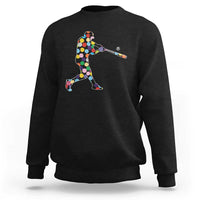 Black sweatshirt with colorful polka-dot baseball player graphic at center chest.