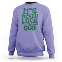 Purple crewneck sweatshirt with green "It's Never Luck" "It's Always God" text graphic